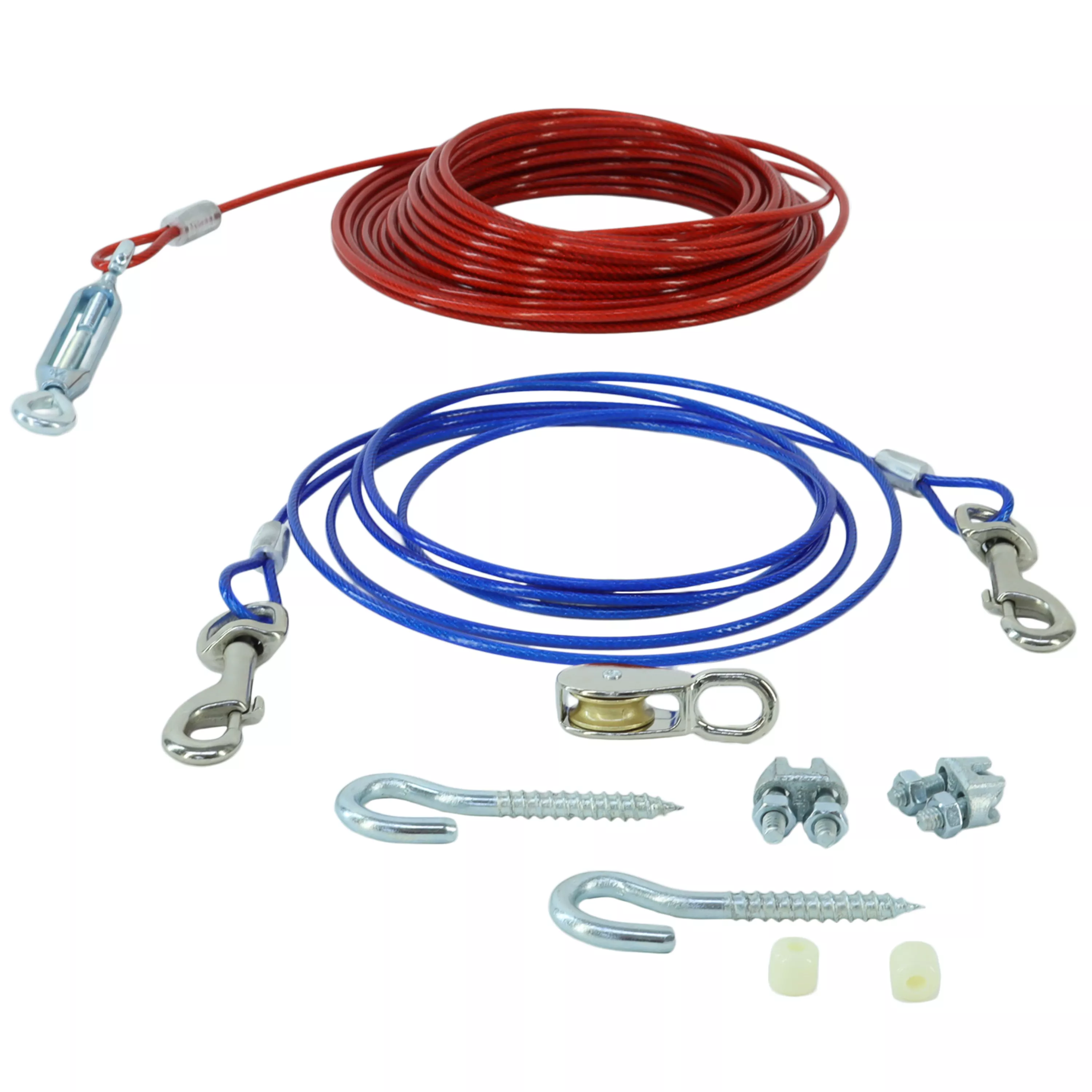 Two aerial dog run cables and assorted hardware are displayed against a plain white background. The cable on the left is dark blue with a smooth plastic coating and is loosely coiled. It has a silver metal swivel snap hook with a spring‑loaded clasp attached at one end. The cable on the right is red with a similar smooth plastic coating and is also loosely coiled, with a silver metal hook component attached. Below the cables are several hardware pieces, including silver metal U‑shaped hooks with threaded ends, a silver metal turnbuckle, cable clamps with screws, a screw eye, and a small metal connector. All items are arranged so that each component is clearly visible.
