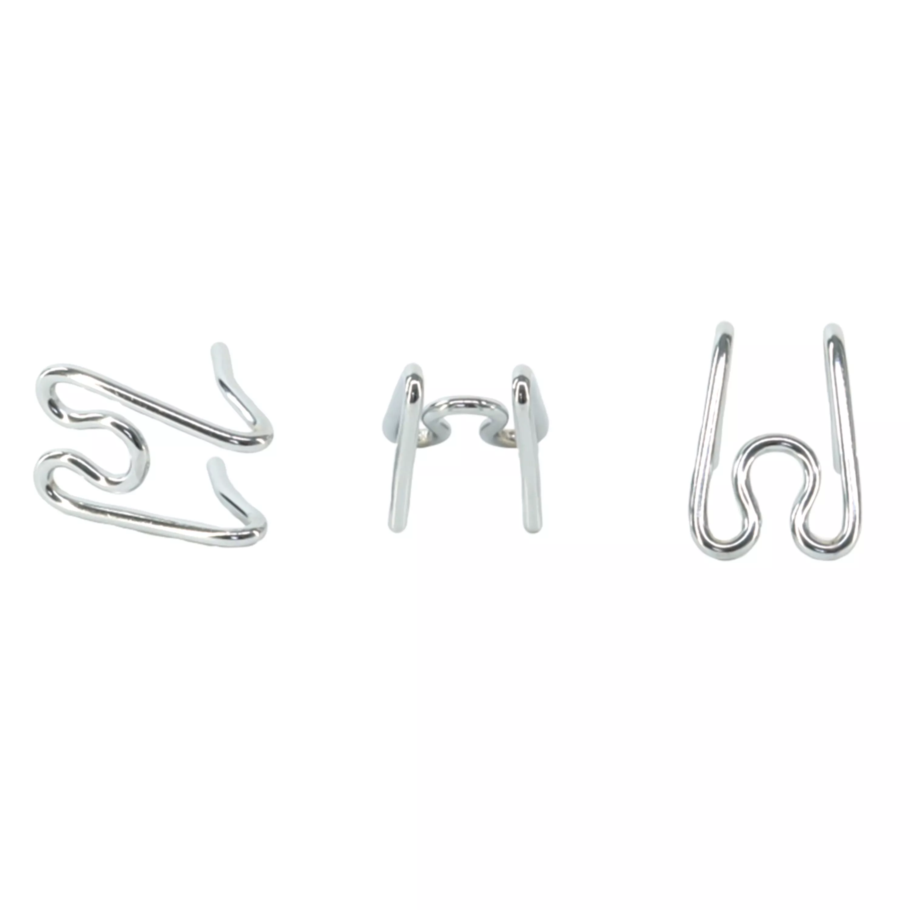 A set of extra prong links for a dog training collar is displayed against a white background. Three identical silver metal prong segments are shown in a horizontal row. Each segment has two inward‑facing rounded prongs and a curved outer bar with open‑ended connectors for attaching to other segments. The metal finish is smooth and reflective.