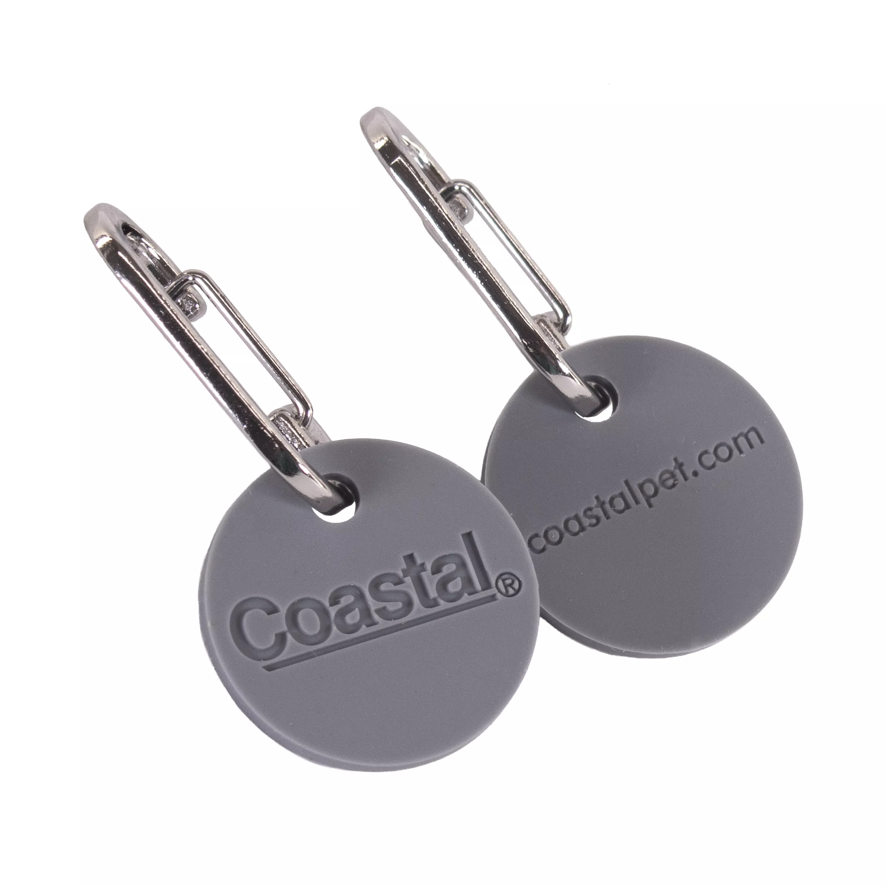 Two gray oval silicone tags engraved with “Coastal Pet" and "coastalpet.com" each attached to a silver clip, placed on a white background.