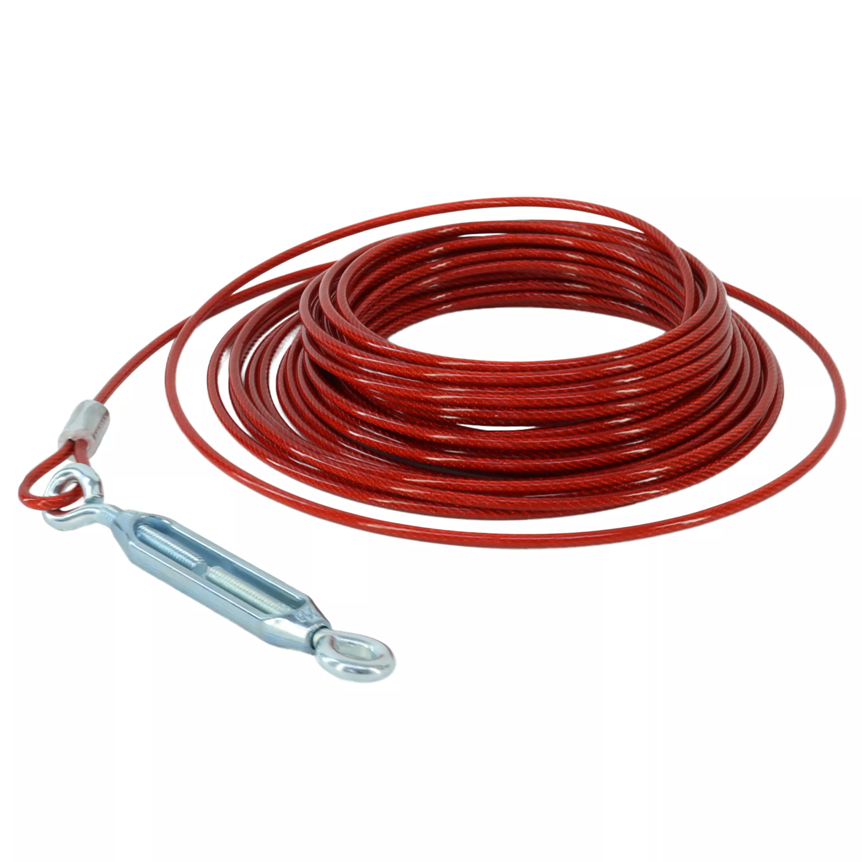 A red aerial dog run cable is coiled on a white background. The cable has a smooth red plastic coating and is arranged in multiple tight loops. A silver metal turnbuckle with a hooked end and a silver metal swivel snap hook are attached to one side of the cable. The cable ends are secured with silver metal crimps. The red coating is consistent in color along the visible length.