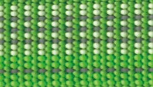 A swatch showing a woven strap in a variegated meadow‑green palette. The pattern is formed by alternating vertical rows of light green, medium green, and white fibers. The dense weave gives the strap a structured, rugged appearance with subtle depth created by the interlaced threads.