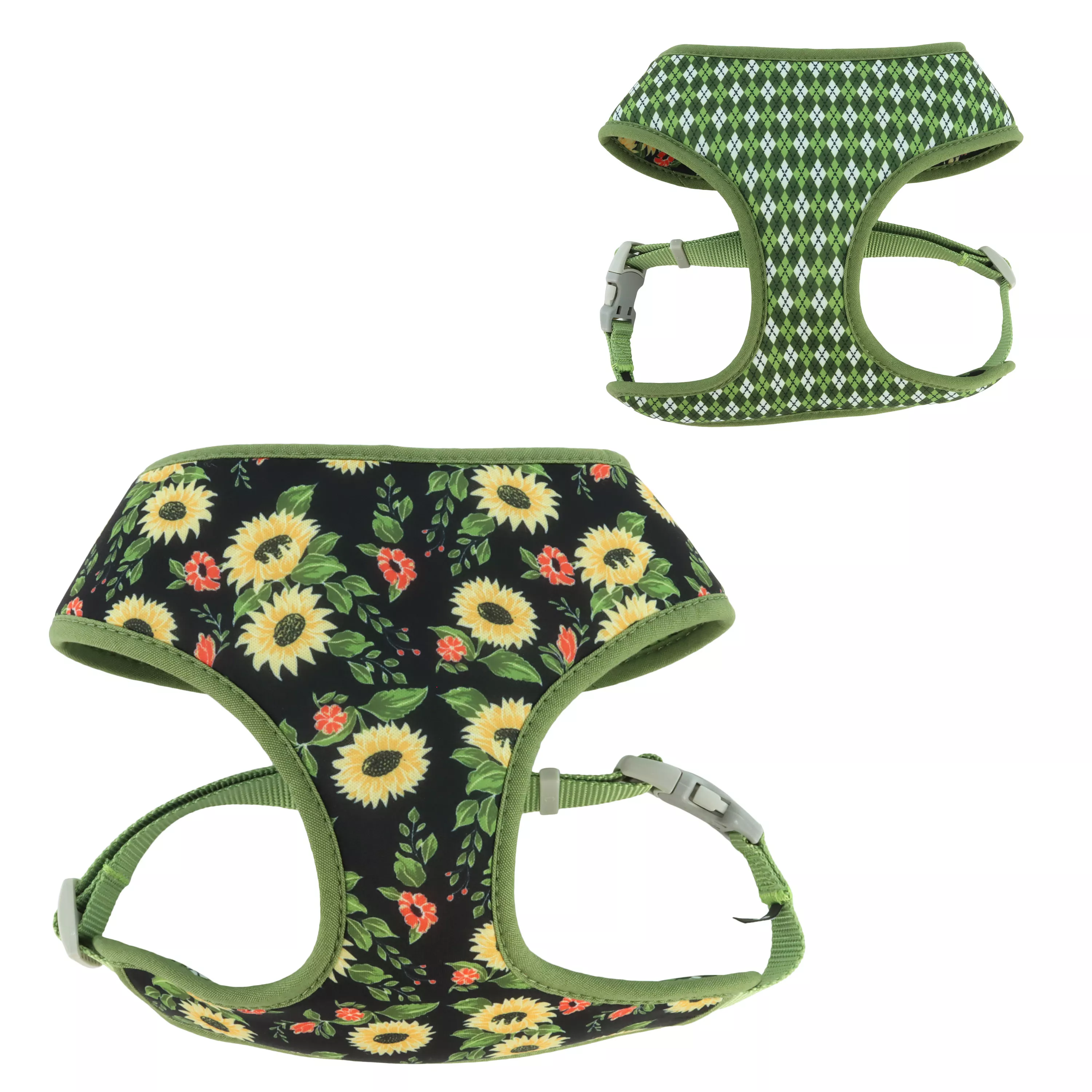 A single dog harness is displayed against a white background. The harness has a green base color with a pattern of small, multicolor flowers and butterflies in shades of red, yellow, orange, blue, and white. The edges and straps are made of solid green material. The harness includes two openings for the front legs, a chest panel, a back strap with a buckle, and two metal rings for attaching a leash.
