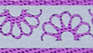 A swatch showing a floral pattern embroidered on a pale lavender background. The daisies have symmetrical petal shapes stitched in medium‑purple thread, with small decorative loops and accents connecting the motifs. A border of stitched purple trim runs along the top and bottom edges.
