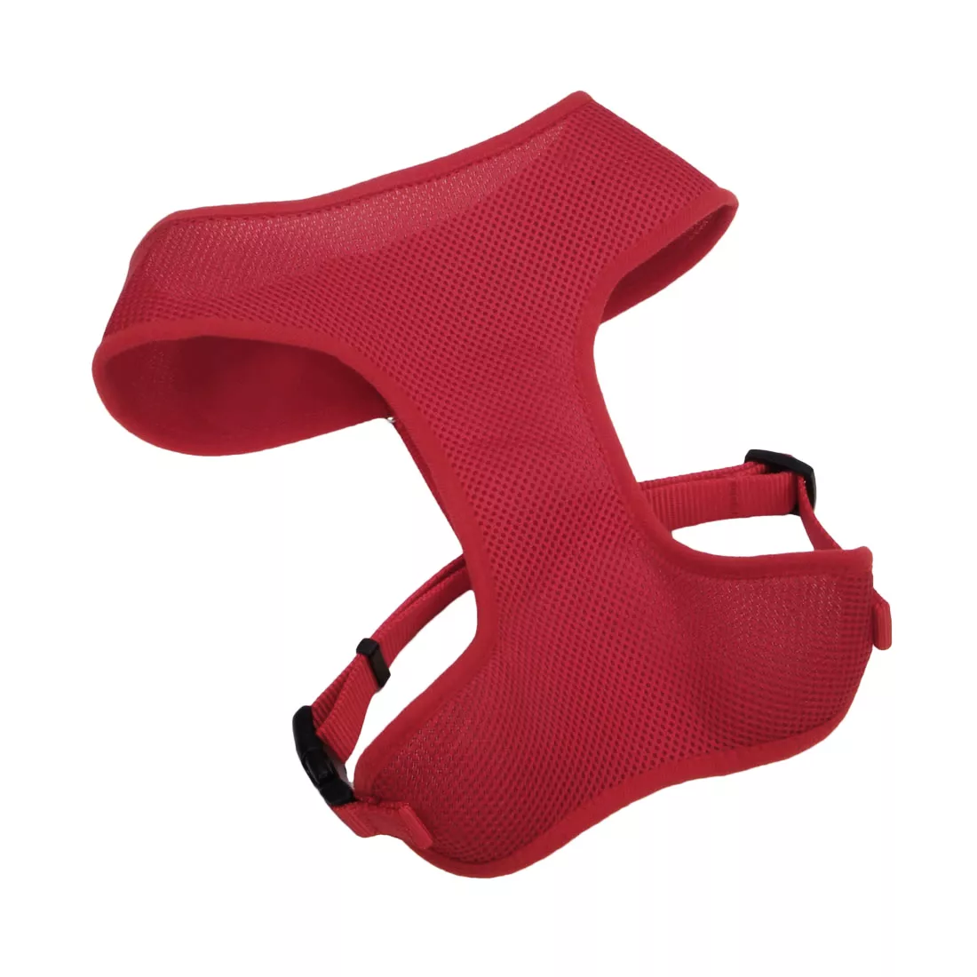 A product‑only image of a red Comfort Soft adjustable mesh dog harness displayed against a white background. The harness features a contoured red padded mesh chest panel with a textured pattern. The woven red straps include black plastic adjusters and a black plastic buckle. A silver‑tone metal D‑ring is attached to the back strap. The harness is shown angled to reveal the neck opening and strap configuration.