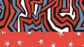 A swatch featuring a bold graffiti‑style pattern in red, navy, and white. The upper portion contains irregular, angular linework resembling street‑art lettering, with thick strokes overlapping in high‑contrast layers. The lower section displays a narrower band of bright red filled with evenly spaced white stars in various sizes. The overall aesthetic is energetic and urban, with crisp printed edges and a smooth, matte finish.