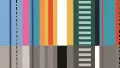 A swatch showing a bright multicolor striped pattern composed of narrow vertical stripes in aqua, teal, orange, yellow, red, black, and white. The stripes vary in width and arrangement, creating a lively rhythm of repeating color. The texture is smooth and printed, giving the swatch a retro Southwestern feel.